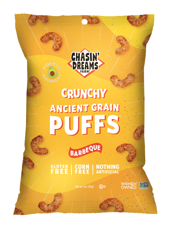 Chasin&#39; Dreams Farm Crunchy Ancient Grain Barbeque Puffs 3oz. Yellow bag with white lines and speckles, orange puffs around the border.