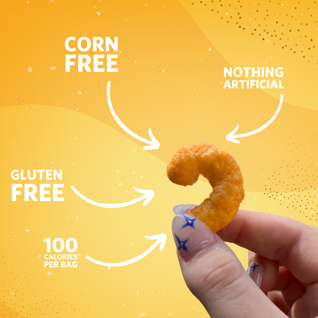 Hand holding cheddar puff, white arrows pointed at it that say: Corn free, nothing artificial, gluten free and 100 calories per bag.