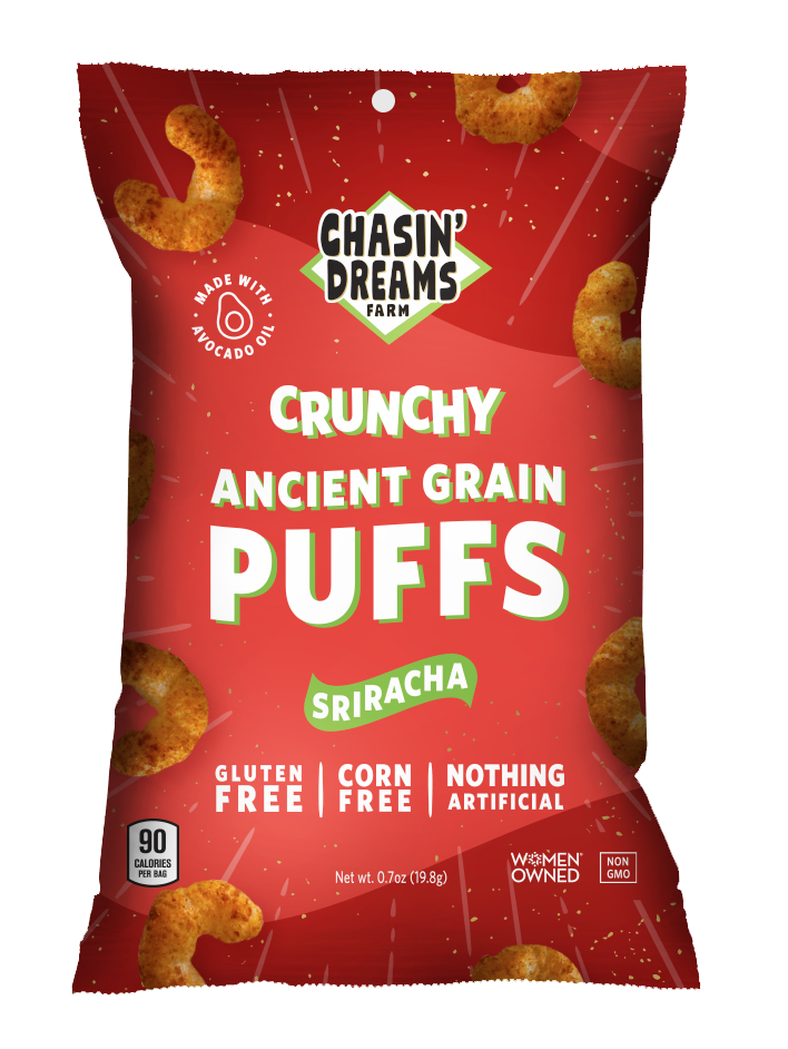Chasin&#39; Dreams Farm Crunchy Ancient Grain Sriracha Puffs 0.7oz. Red bag with white lines and speckles, red puffs around the border.